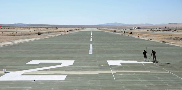 Numbers are painted on the runway at “Camp Wilson,” part of the Marine Corps Air Ground Combat Center at Twentynine Palms in California (USMC photo)